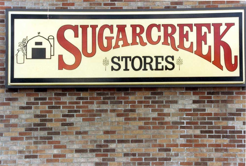 Sign on the front of a Sugar Creek Store