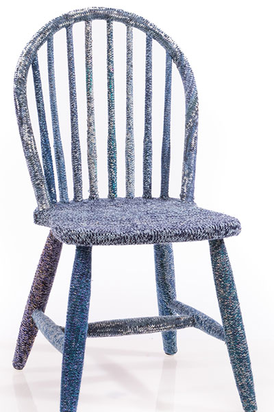 Chair covered in blue yarn
