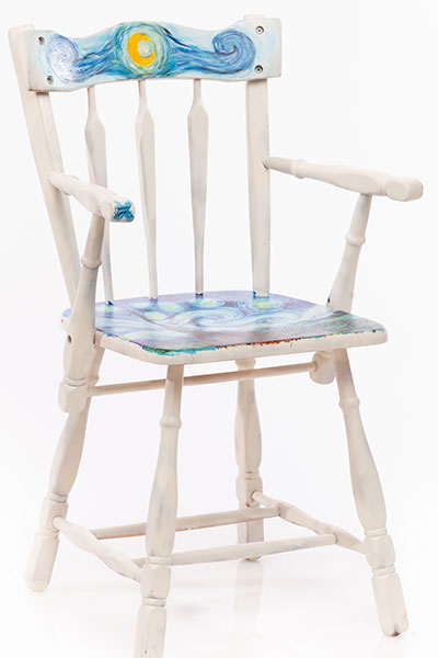 This chair is a duplicate of the famous Starry Night by Van Gough but painted on a different canvas. 