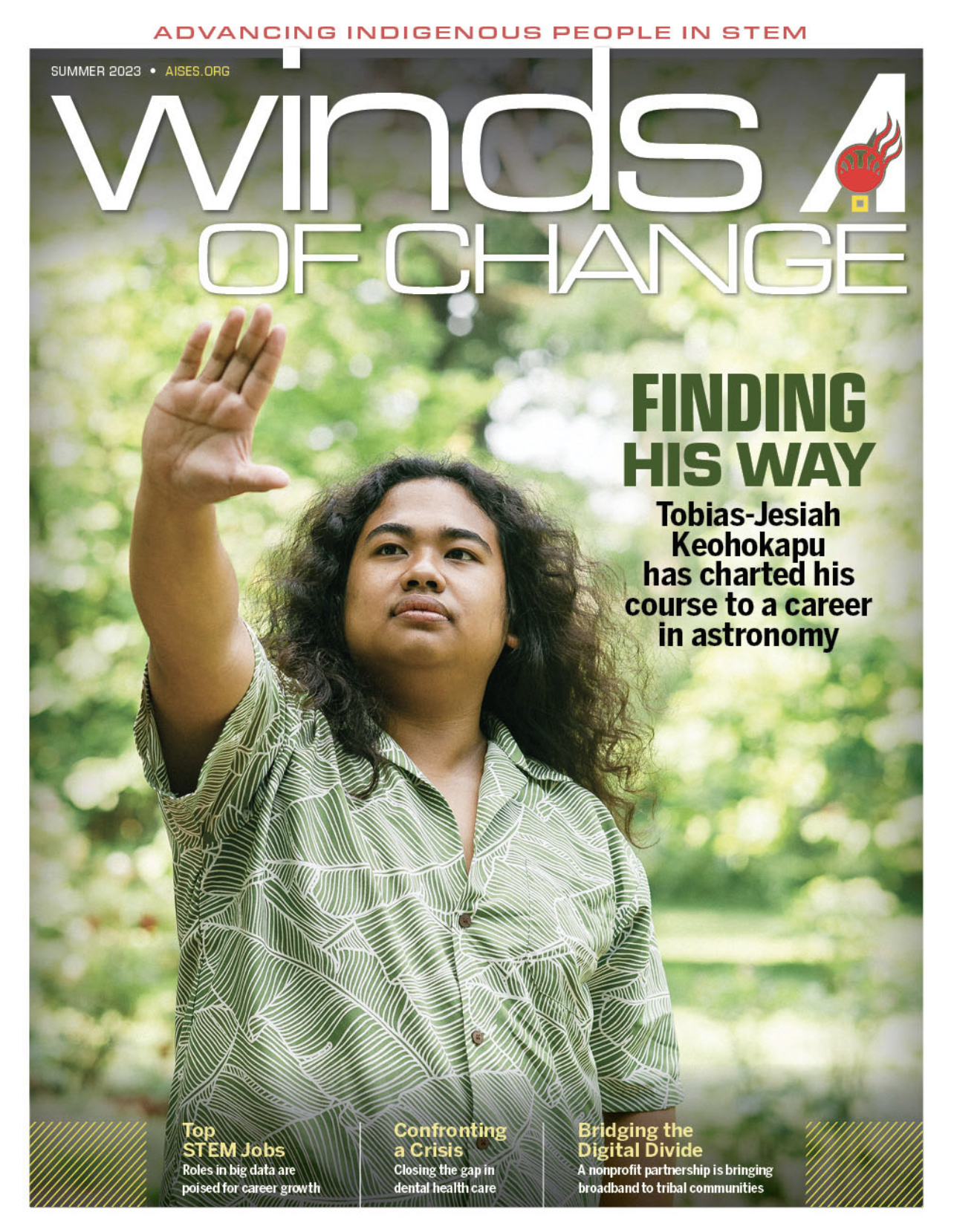 magazine cover with man in green shirt holding hand/arm up into air