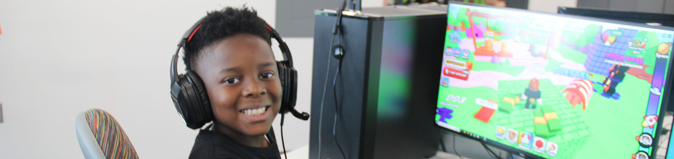 a person playing a video game and smiling