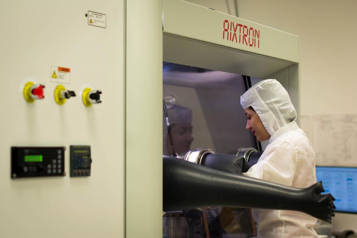 Mohad is seen here loading a sample in the AIXTRON 3×2 Close Coupled Showerhead metal-organic chemical vapor deposition (MOCVD; RIT NanoPower Research Laboratories) reactor, which she uses for crystal growth of III-V semiconductor nanowires.