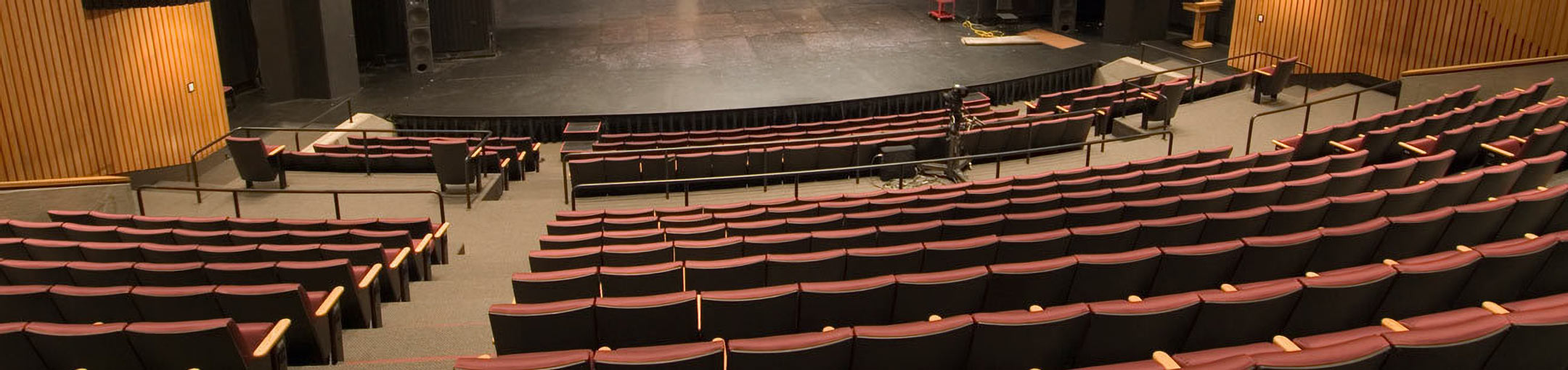 A view of the stage in the Robert F. Panara Theatre from a seat in the audience.