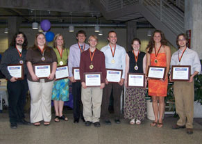 group shot of students holding awards