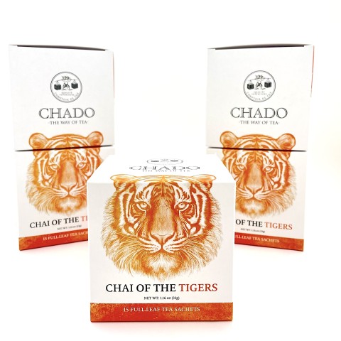 three square white boxes with an illustration of a tiger head and the words 'Chai of the Tiger' printed. 
