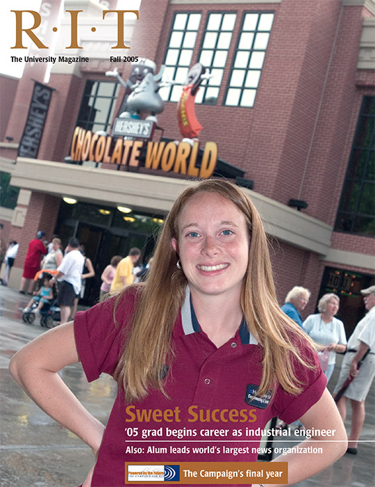 University Magazine cover featuring student standing in front of Hershey's Chocolate World.