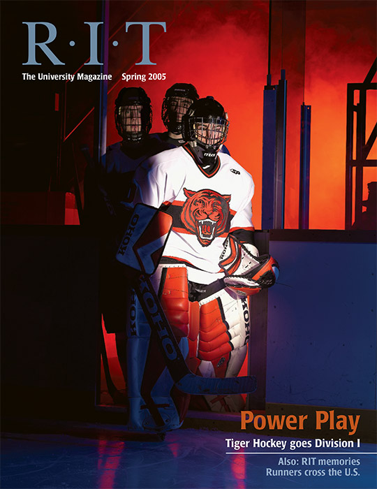 University Magazine cover featuring hockey players entering the ice.