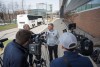 RIT mens hockey coach Wayne Wilson speaks to the press ahead of the team’s departure from campus. 