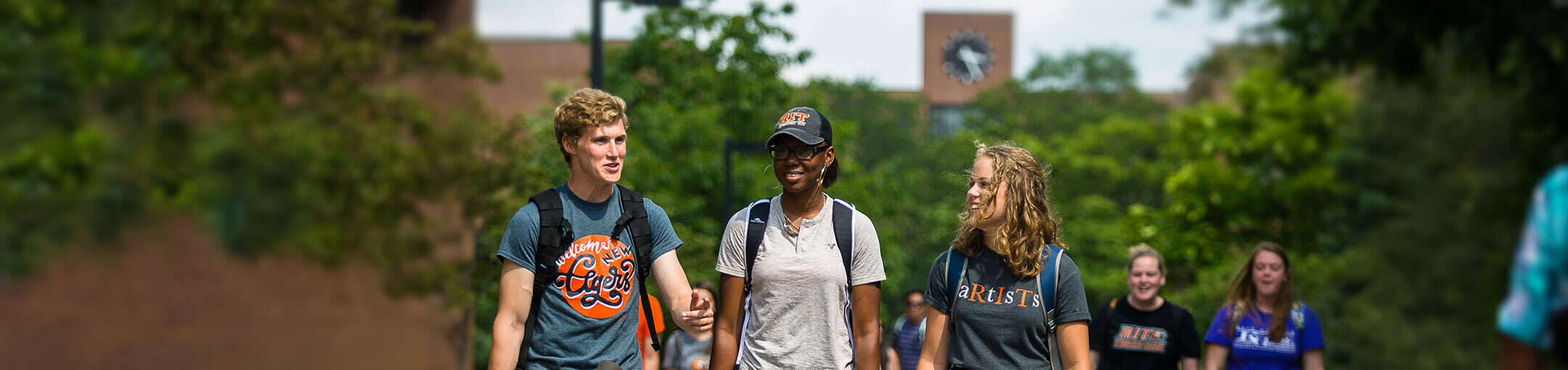 Students walking down the Quarter Mile walkway at R I T.
