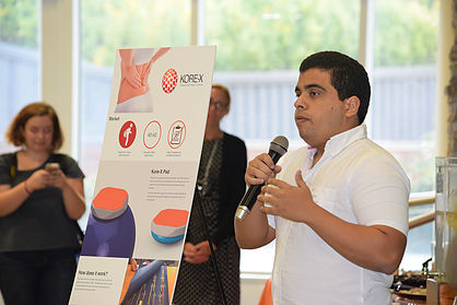 Photo of man giving speech at a presentation