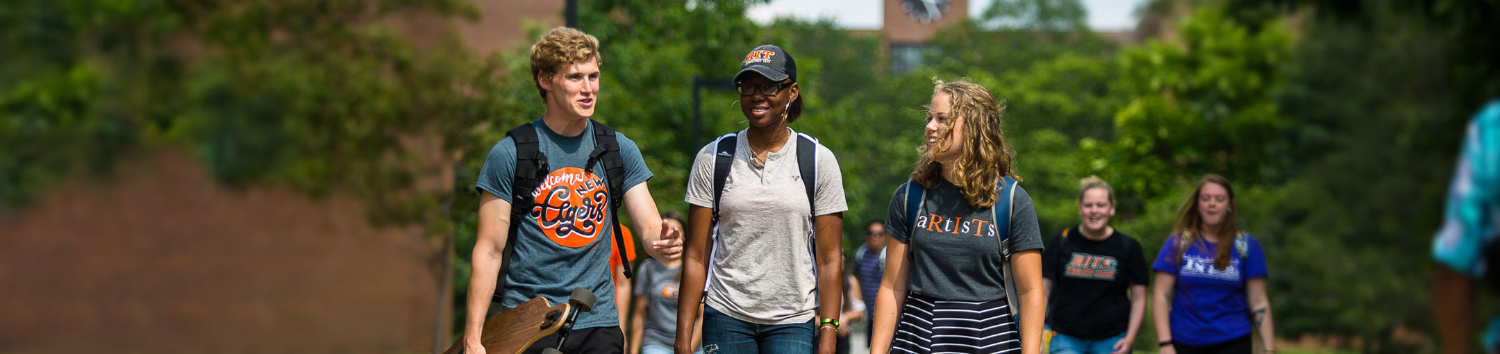 Students walking down the Quarter Mile walkway at RIT.