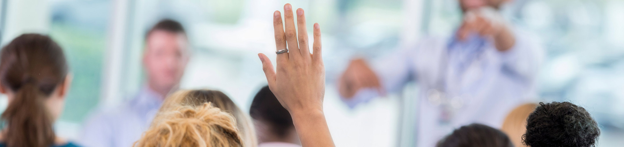 background image of person raising their hand