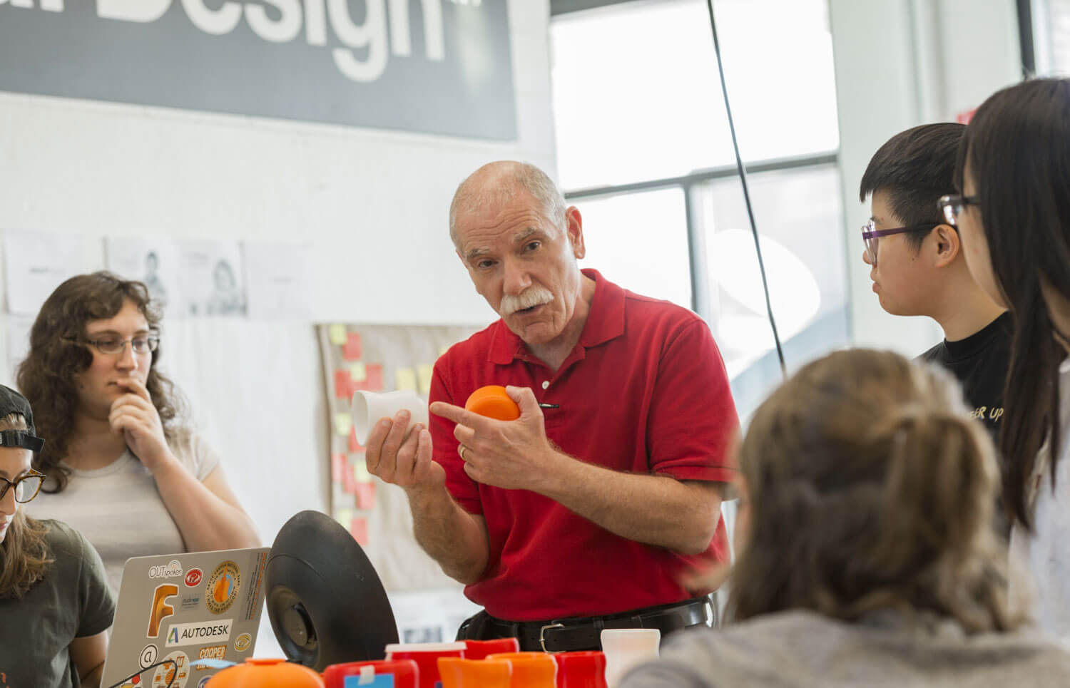 An R I T faculty member leading a hands-on demonstration.