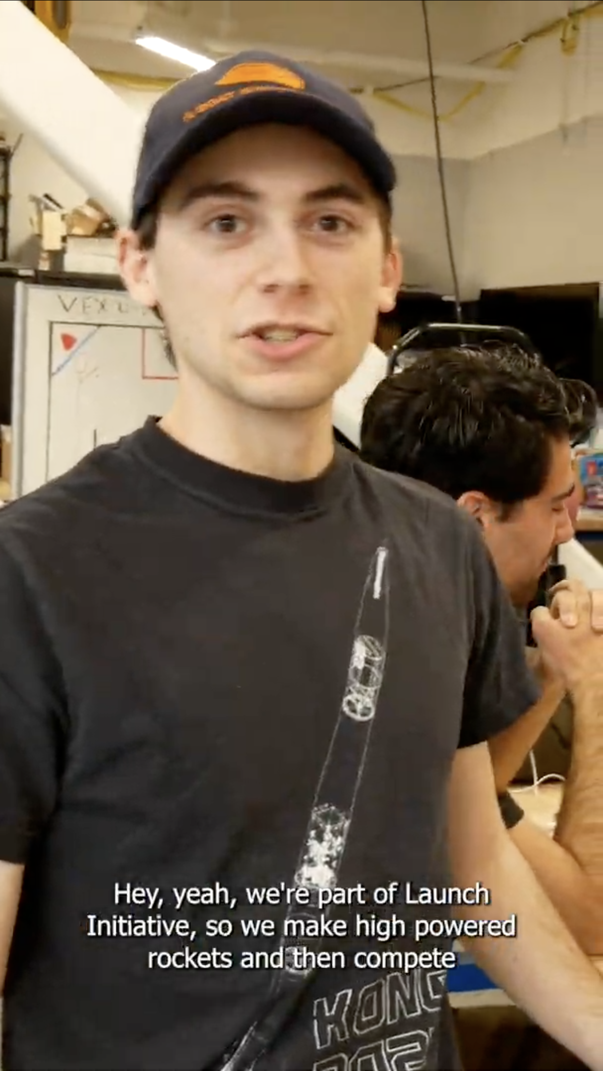 Student talking about a rocket