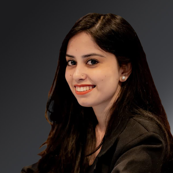 portrait of rashmi bhardwaj on a gray background