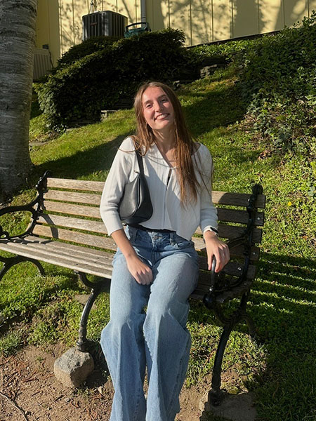 photo of student on park bench