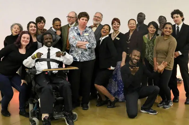 18 members of the cast and crew of 'Photograph 51' making funny faces as they pose for a group photo.