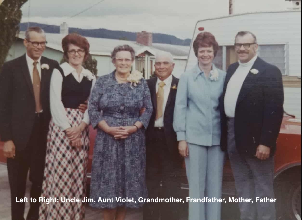 vintage pic Six people standing in front of a car