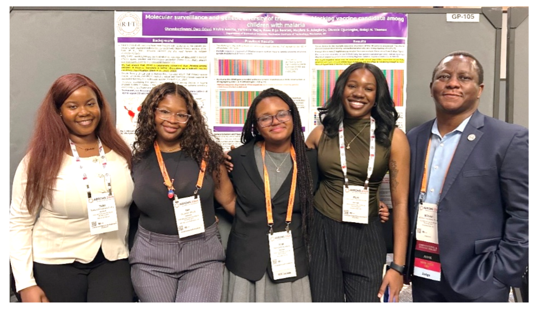 Group of people infront of an informational poster