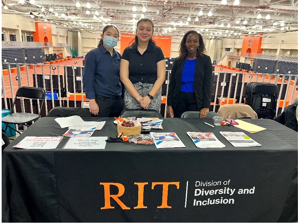 three students at table