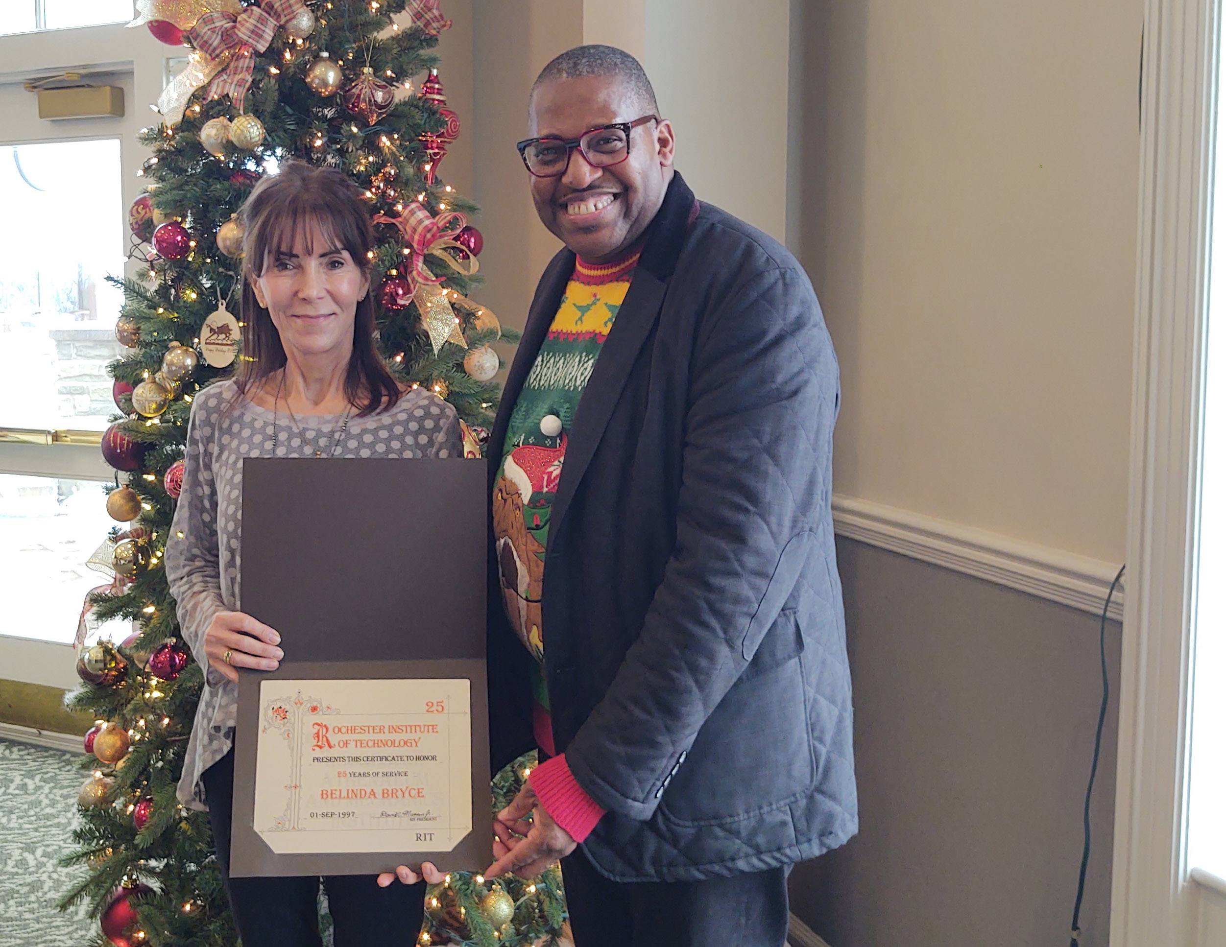 two people standing next to eachother