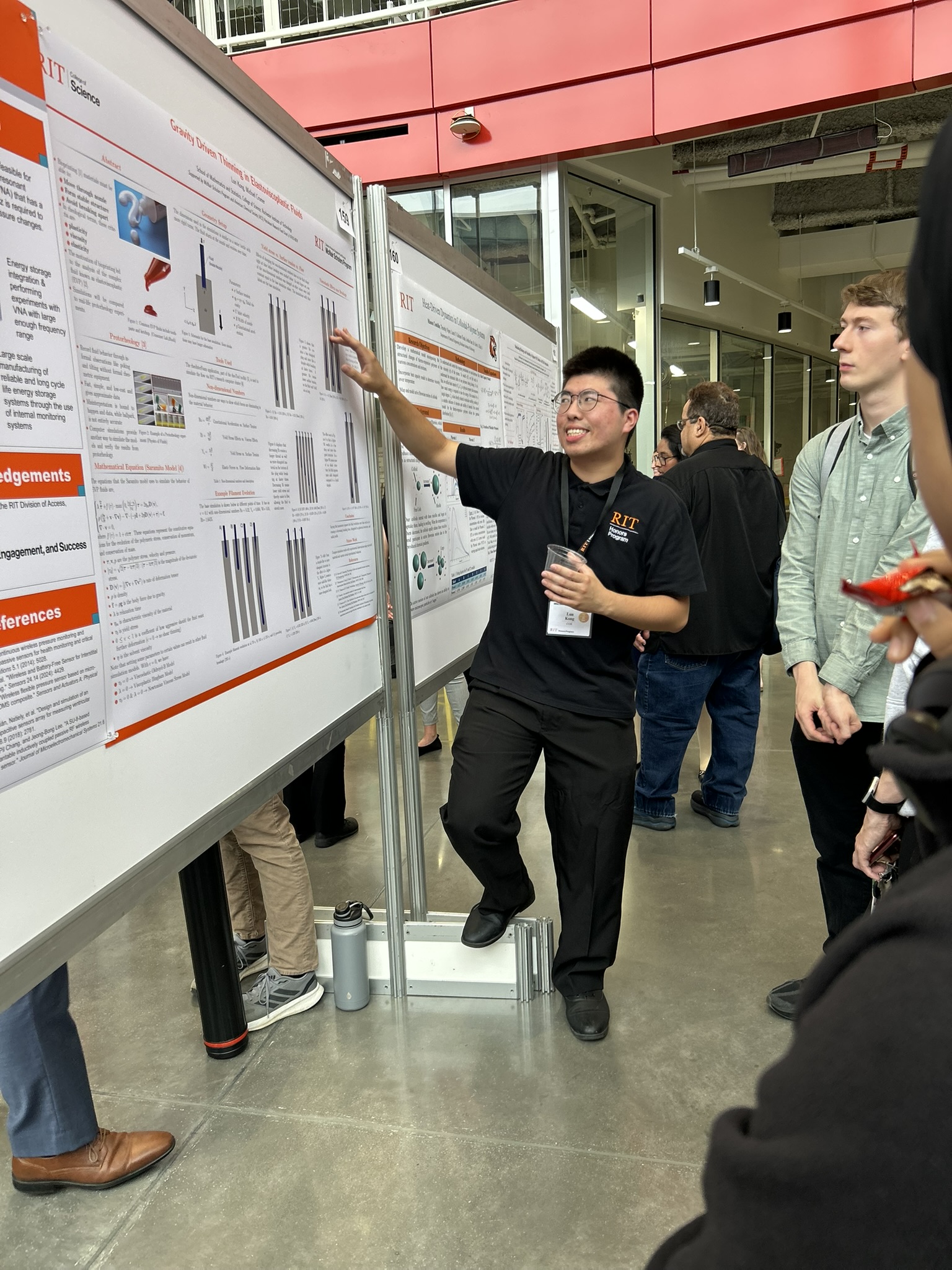 Person preseting research at a board