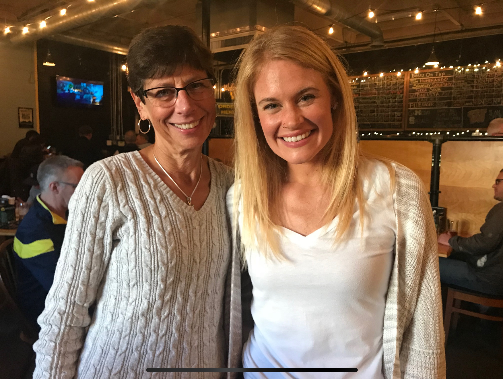 two women standing next to eachother