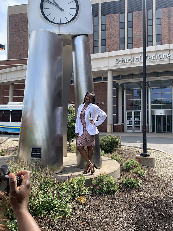 black woman standing outside