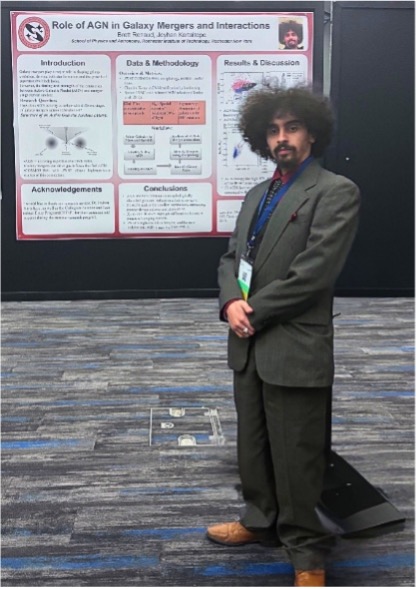 man standing infron of presentationb board