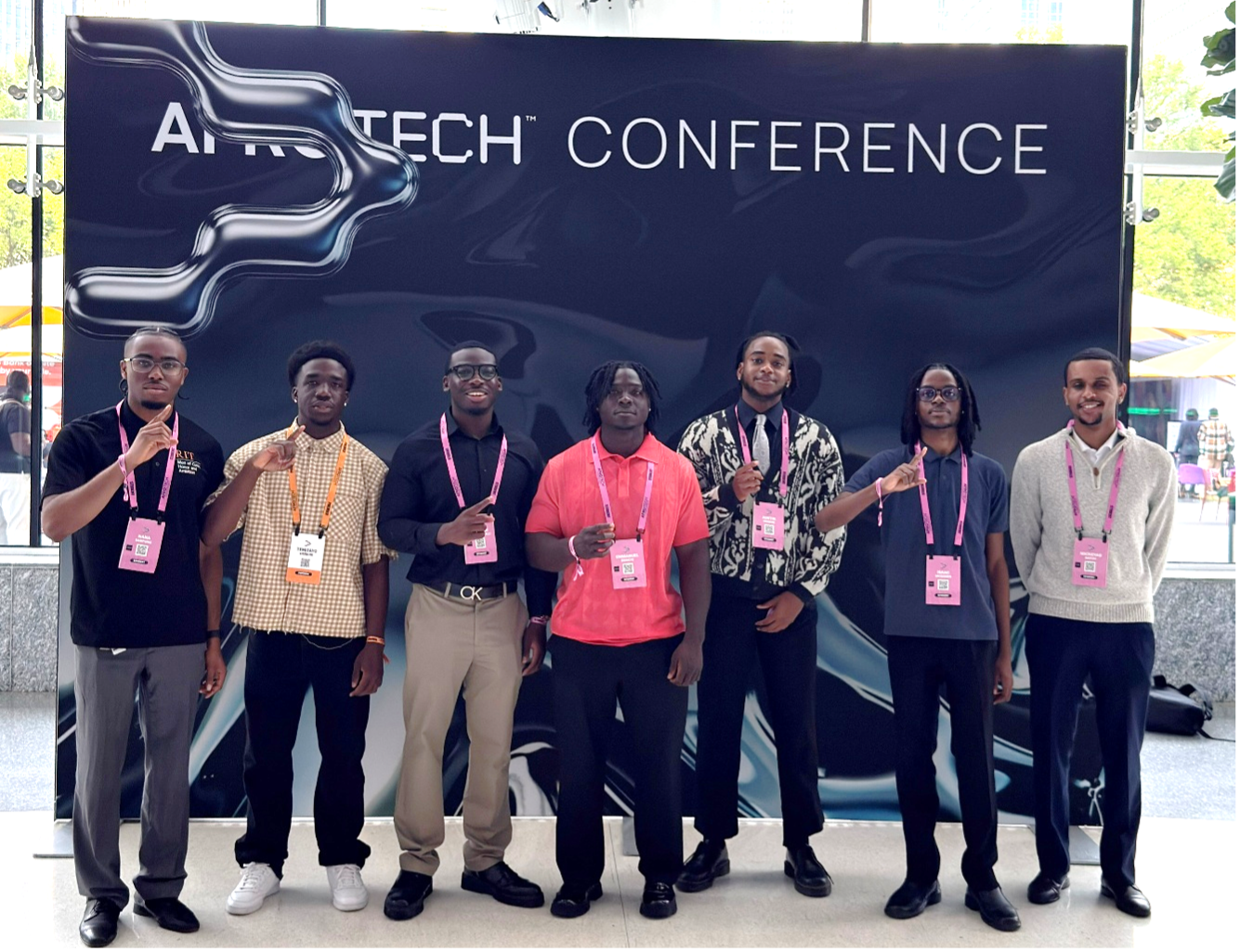 group photo in front of Afrotech banner