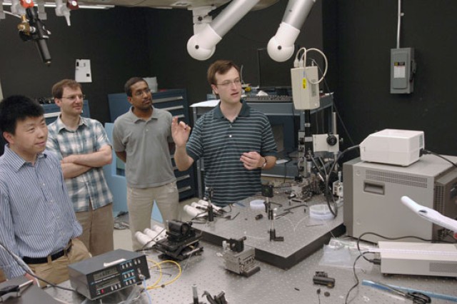 Professor teaching in lab