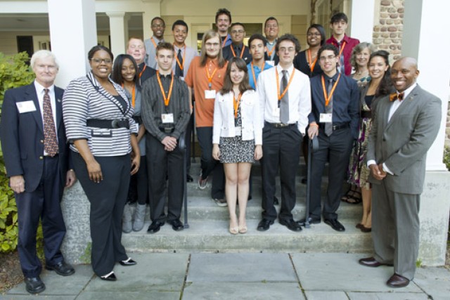People gathered around the entrance to building