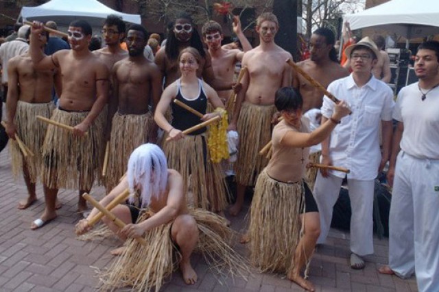 Performers posing for camera at event