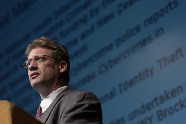 Professor giving speech at podium
