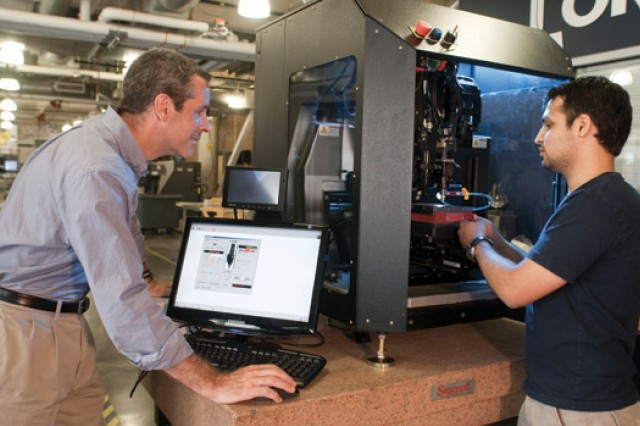 People working on machine