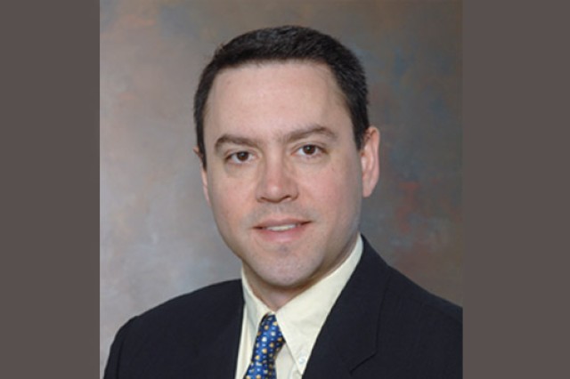 Professor posing for camera