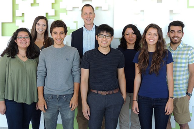 Research team posing for camera