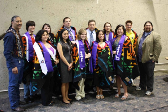 People gathered posing for camera