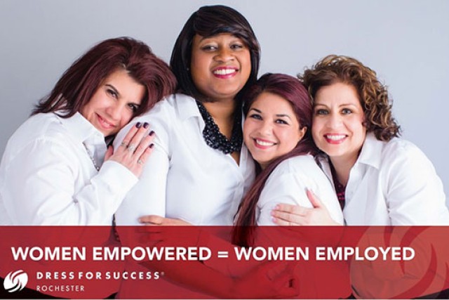Four women wearing white shirts pose for a photo. Text at the bottom saying "women empowered equal women employed".