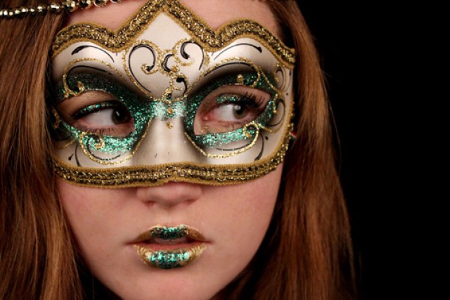 Person posing with mask