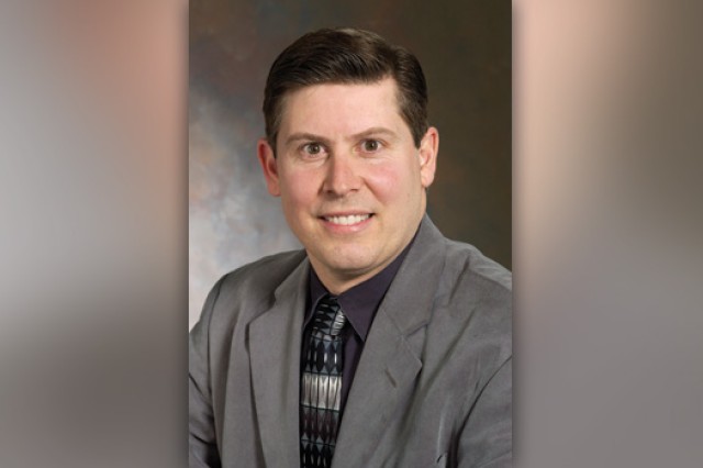 Professor posing for camera