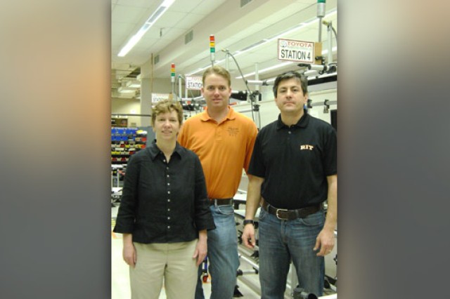 People posing in lab