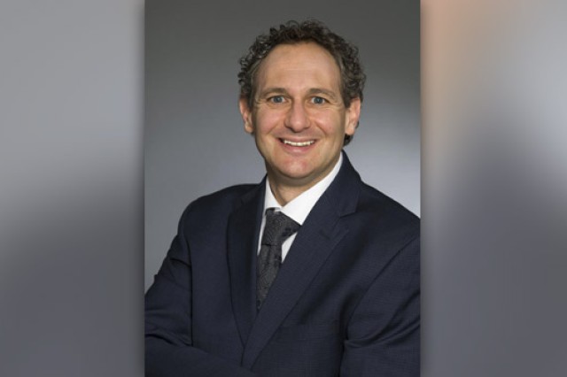 Professor posing for camera