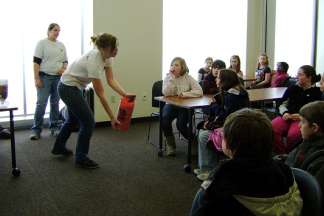 Person teaching kids