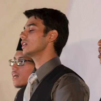 People singing on stage