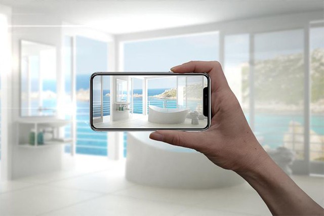 Smart phone taking photo of bathroom