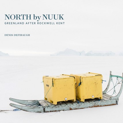 'North by Nuuk' book cover, featuring two yellow boxs on wooden sled on a sheet of ice.