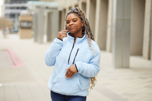 Woman using Black American Sign Language.