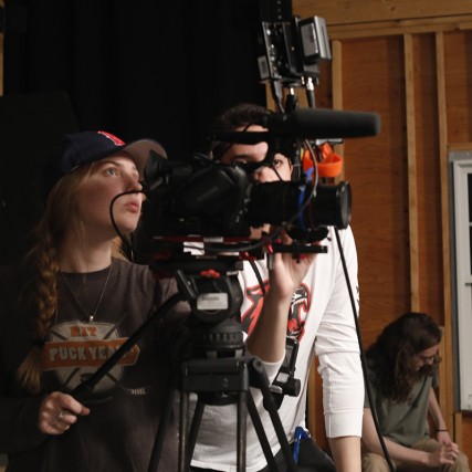 Gayle McAdams operates a camera in the soundstage.