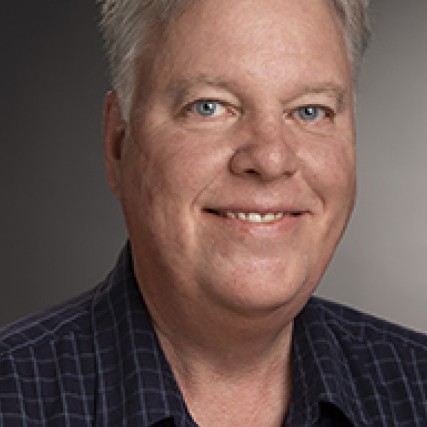 Professor posing for camera